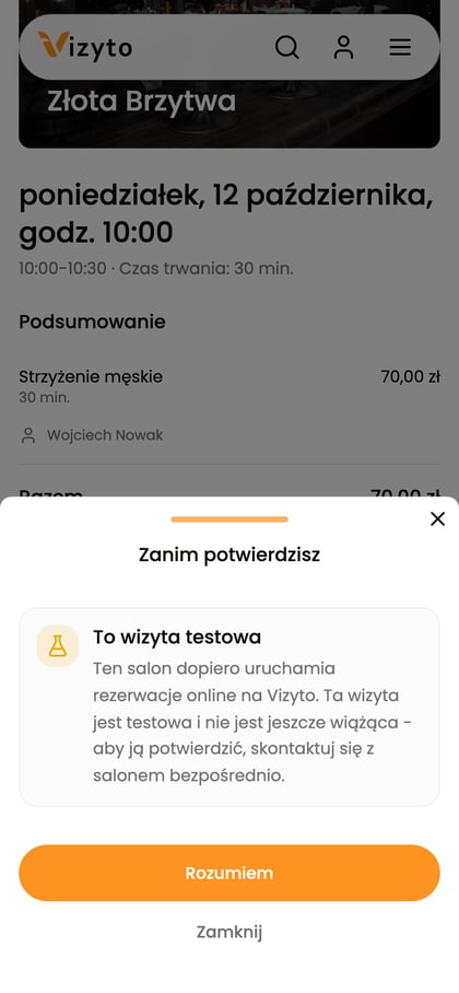 Komunikat „To wizyta testowa” przed wysłaniem rezerwacji.